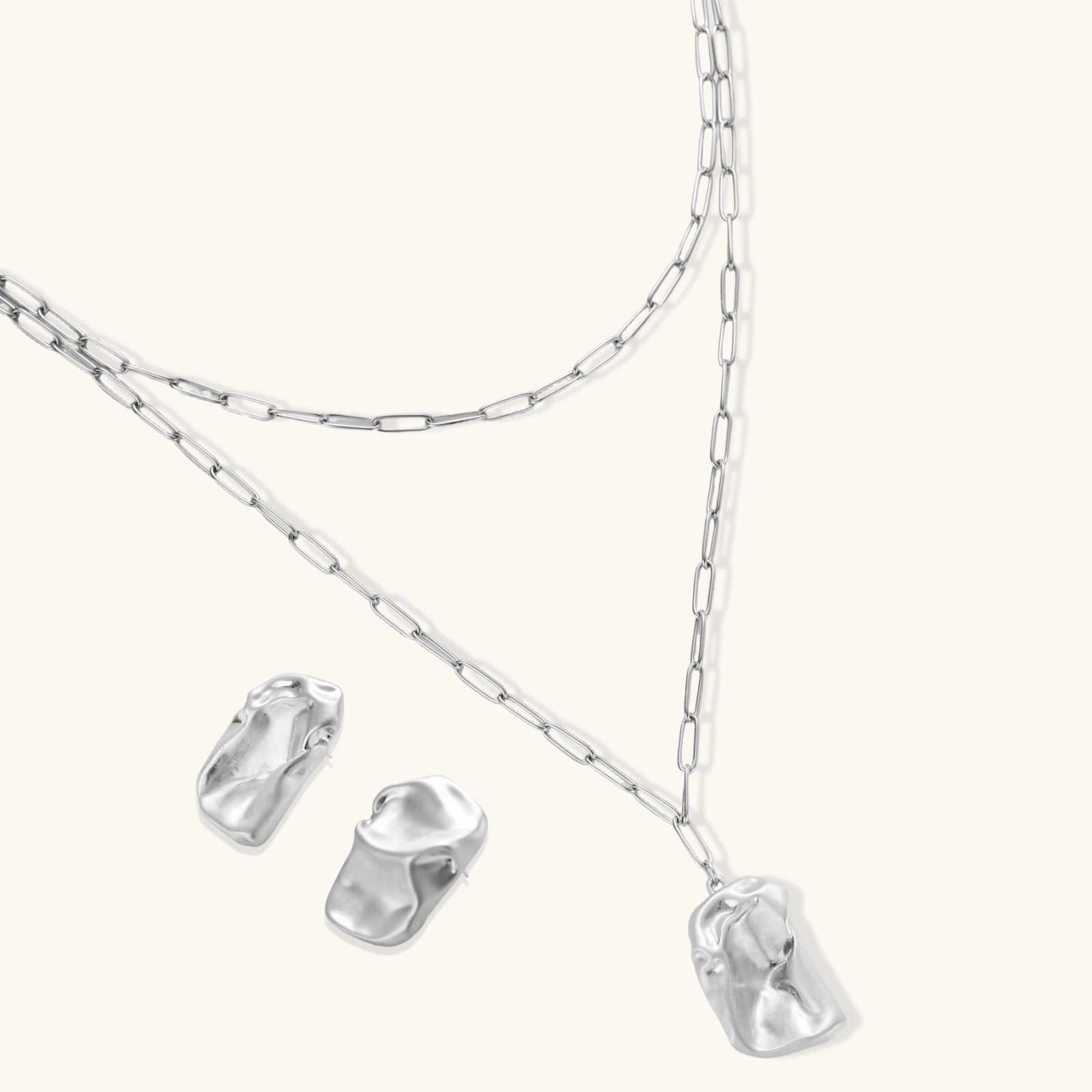 Parure Métal Liquide — Collier & boucles texturées